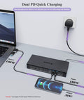 Pro Level Usb C Docking Station Packing 20 Ports With Quad Monitor Support Delivers Legit Dual 5k At 60Hertz Output Fast Charging connected to a laptop and smartphone.