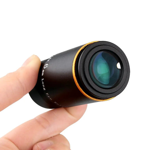 Close-up view of a 1.25 Inch Telescope Eyepiece 66 Degree Ultra Wide Angle Fully Multi Coated 6mm Focal Length held in hand.