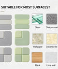 Door Stop Wall Protector Set Of 6 With 0.4 Inch Square Soft Rubber Bumpers displayed on various surfaces like glass and tile.