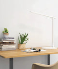 LED Desk Lamp With USB Charging Port, 700 Lumens Dimmable Touch Control Table Lamp For Home Office on wooden desk