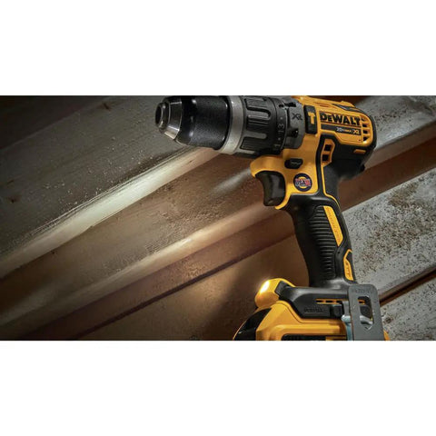 20V Max XR Cordless Hammer Drill with Brushless Motor on unfinished wood surface