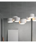 Sleek Six Head Led Pendant Lamp With Rock Solid Iron Frame smooth dimming tech, modern kitchen lighting fixture, clean design.