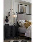 Kempsey Collection One-Light Swing Arm Wall Bracket Nickel Finish beside bed with modern decor, Summer Linen shade