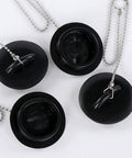 Bathtub Drain Stopper with Rubber Bath Plug in black, featuring removable chain for ease of use, designed for various drain types.