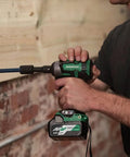 Person using Cordless Impact Wrench With One Half Inch Drive, 225 Ft-Lbs Torque, Brushless 18V Tool Only No Battery, IP56 Rated