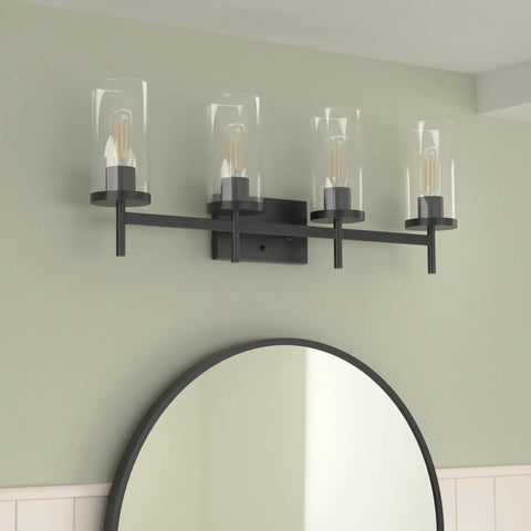 Winslett Lit Matte Black Bath Vanity Light With Clear Ribbed Glass Shades Transitional Steel Fixture mounted on wall