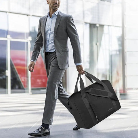 Man with Underseat Travel Duffel Bag 25L Foldable Personal Item For Women And Men Fits Spirit And Frontier Size Under Seat Carry On Luggage Black With Thick Lining And Internal Organization For Easy Packing