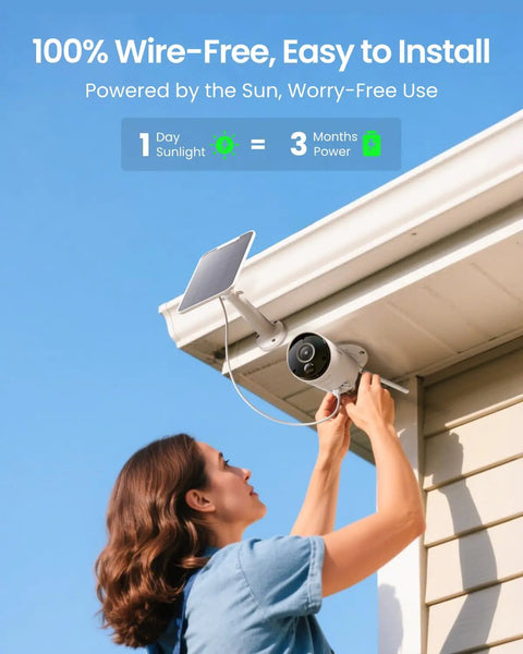 Person installing Solar Powered 2K 5MP Outdoor Security Camera With Night Vision And Smart Human And Car Detection under eaves