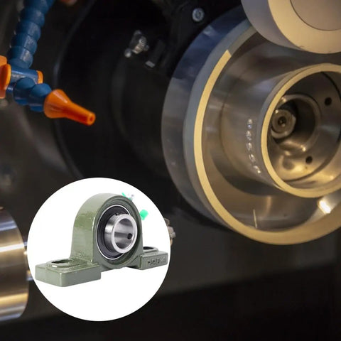 Heavy Hitter Cast Iron Pillow Block Bearing Kit Featuring Dual Bolt Flange Housing And Compact Two Hole Design For Cramped Workspaces And Daily Factory Production Lines mounted in machinery.