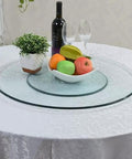 Heavy Duty Turntable Lazy Susan Tempered Glass Serving Tray on dining table with fruit and wine
