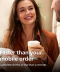 Fully Automatic Espresso Machine Crushing Your Morning Cravings With One Touch Brewing And Classic Milk Frother For Silky Cappuccinos Featuring Precision Ceramic Grinder And Sleek Black Touch Display, woman smiling with latte in hand.