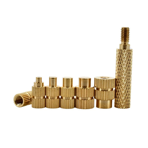 Rock Solid Brass Thermal Insert Nuts Featuring Precise Internal Threads For Printed Boards And Electronics Fix Ups Set Of Eight High Temperature Dissipation Hardware Built Tough And Dang Reliable For Serious Soldering Work arranged in a row.