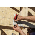 Carpenter using Professional Aluminum Rafter Square 7 Inch With CNC Edges For Dead On Angles on wooden beam