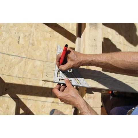 Carpenter using Professional Aluminum Rafter Square 7 Inch With CNC Edges For Dead On Angles on wooden beam