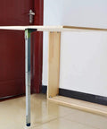 Built Tough Hassle Free Stainless Steel Folding Table Legs For Dining Desk And Bar Rig With Smooth Telescopic Adjustments and rock steady grip on a wooden table.