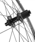 Close-up of a hub and spokes on a Carbon Disc Brake Wheelset 700c 50mm By 25mm Tubeless Ready For Road Biking Paint Free Finish Toray T700 Fiber
