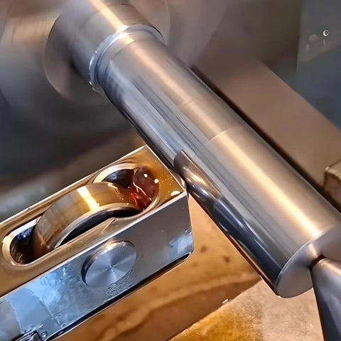 RHKING mini lathe burnishing tool, close-up view, silver metal, installed on a lathe with a cylindrical shaft and workpiece.