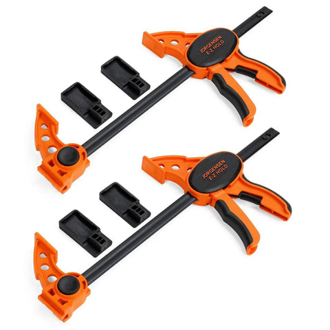 Two orange Jorgensen EZ Hold 12in ratchet bar clamps with black handles and accessories