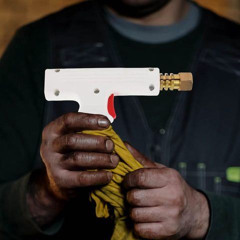 Person holding Portable Car Spot Welder And Sheet Metal Repair Torch For Auto Body Fixes Multi Functional Welder Tool