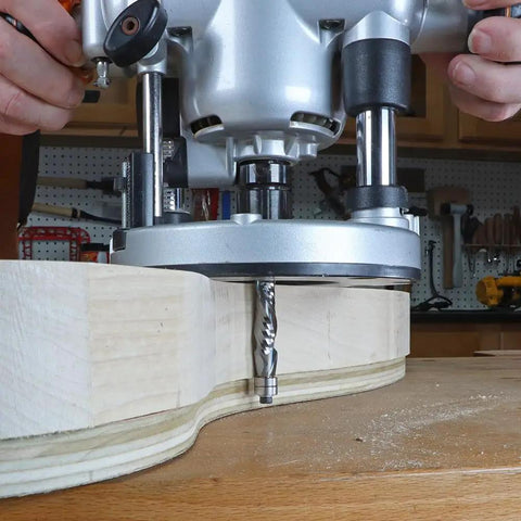Solid Carbide Compression Flush Trim Router Bit Set Runs Smooth As Silk Keeps Clean Cut Lines For Awesome Cabinet Upgrades Two Piece Workshop Kit in use on wood.