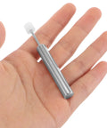 Person holding a component of the Super Quiet Trash Can Damper Kit For Kitchen And Office Use 4 Pack with hydraulic piston