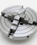 Close-up of Bad Boy Heavy Duty Six Inch Four Jaw Self Centering Wood Lathe Chuck Crafted From Premium Steel for woodturning.