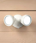 Outdoor Security Flood Light Twin Head LED Dusk To Dawn 1600 Lumens White with Photocell Sensor mounted on a wall