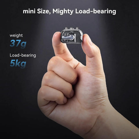 Hand holding Drop In HawkLock Mini Quick Release Plate with One Quarter Inch Screw, showing size, weight 37g, load-bearing 5kg.