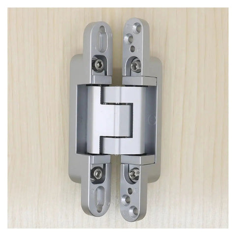 Zinc Alloy 180 Degree 3D Adjustable Concealed Door Hinge in Silver mounted on wood, sleek design for hidden mount