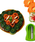 Green handheld spiral slicer with stainless steel blade; carrot and cucumber spirals arranged on a plate.