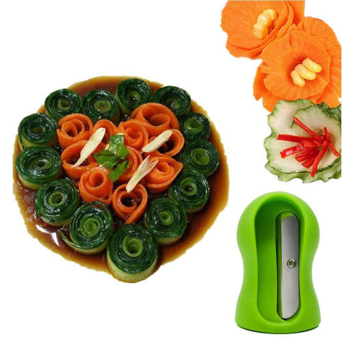 Green handheld spiral slicer with stainless steel blade; carrot and cucumber spirals arranged on a plate.