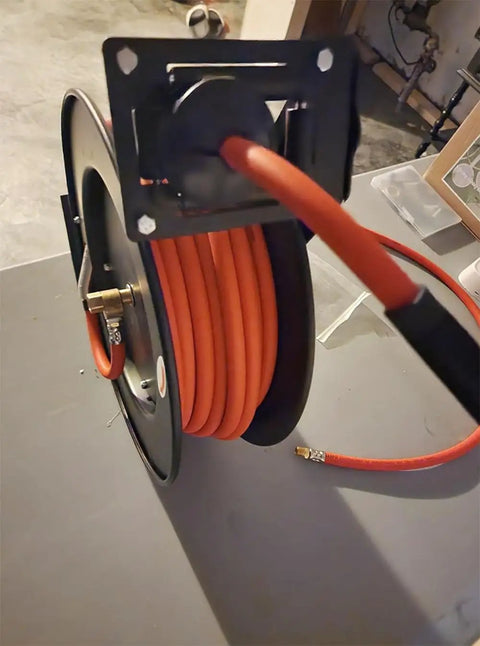 Mounted Retractable Air Hose Reel With Wall Or Ceiling Mount, Three Eighths Inch By Fifty Feet Hybrid Hose With Three Feet Lead In, Steel Auto Rewind, 300 PSI, All Weather Temperature Range Minus Forty To One Hundred Fifty Fahrenheit, Durable Pneumatic Hose Reel.