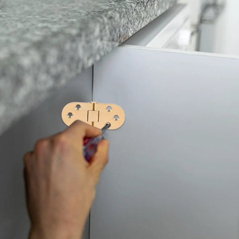 Installing brass table hinges 2-piece set for butler tray and cabinet furniture, showing easy mount and smooth finish