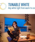 Woman reading with Smart LED Vintage Glass Filament G25 Bulb 40W Equivalent Tunable White 2200K To 6500K Bluetooth WiFi 2.4GHz No Hub Needed Works With Alexa And Google Home 6 Pack overhead