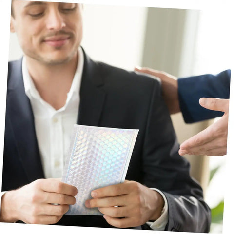Person holding Colorful Bubble Mailer Bags 15 By 20 Cm Plus 4 Cm Waterproof Padded Envelopes Self Seal For Secure Shipping And Packaging Supplies