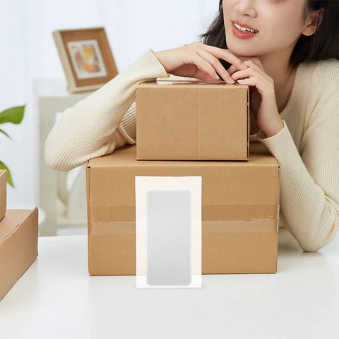 100 Pack Foam Pouch Bags For Shipping And Mailing Small Electronics And Photo Frames shown on stacked boxes