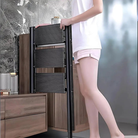 Person adjusting the Smooth Operator Electric Attic Ladder With Remote Control and Heavy Duty Handrail in a modern interior.