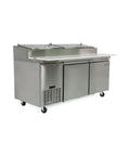 Heavy Duty 16 Cu Ft Two Door Commercial Prep Table Refrigerator In Crisp Stainless Steel with two open food pans and a cutting board.