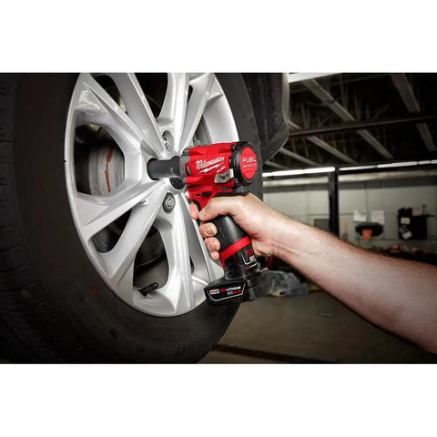 Using Stubby Three Eighths Inch Impact Wrench With Four Mode Drive Control For Tight Spaces on car wheel, 250 ft-lbs torque, auto shut off