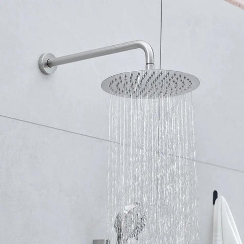 Shower Faucet System, 10-Inch Round Head, 5-Spray Handheld, Brushed Nickel with water flowing from the round head.