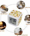 Compact Digital Alarm Clock With Cute Sunflower Butterfly Cube Shape Silent Sweep Motor and Soft LED Glow, showing time and temp.