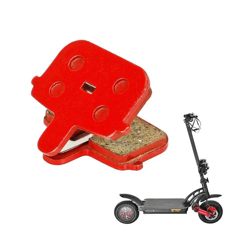 Rectangular Hollow Semi Metal Disc Brake Pads Set for MTB Bikes and Electric Scooters, shown near a Kugoo G-Booster