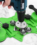 Diamond hole saw kit front view with drill guide jig and suction cups on green base