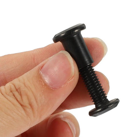 Top Shelf M6x25 Black Stainless Steel Binding Screw held in hand, ideal for secure furniture assembly and woodworking projects.