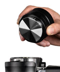 Straight Fire Dual Bearing Espresso Distributor And Tamper Combo Fits 51 54 58mm Filter Baskets in use, showing hand positioning.