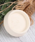 Top view of a beige 4pcs Rubber Sink Stopper Plug with Hanging Ring for Bathtub Drains, showcasing its round shape and smooth surface.