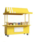 Rock Solid Mobile Vendor Cart With Weather Proof Canopy, Heavy Duty Iron Frame Street Food Stall For City Markets And Festival Grinds, yellow cart with open roof and products displayed.