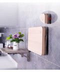 Beefy Stainless Steel Foldable Triangular Bracket Set 2 Pack Wall Mount supporting a wooden shelf in a kitchen setup.
