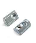 Two Roll-In T-Nuts With Ball Spring 5/16-18 shown with threaded opening, 15 Series Aluminum Extrusion compatible, heavy-duty for CNC builds.