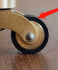 Heavy Duty Brass Rubber Caster Wheels For Furniture Move Like Butter Swivel Replacement Casters With Vintage Cup Base and Screw Mount silent glide close-up showing wheel detail.